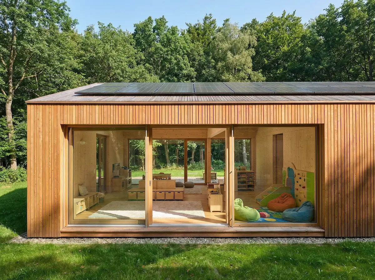 Large insulated wooden garden house with solar panels UK