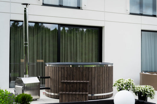 200 cm round fiberglass hot tub with external wood-fired heater and wooden steps