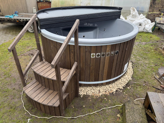 225 cm round fiberglass hot tub with half-open insulated cover and wooden steps, front view