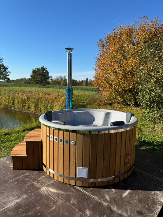 Premium 200 cm round fiberglass hot tub with integrated wood-fired heater, front view with wooden steps and control panel