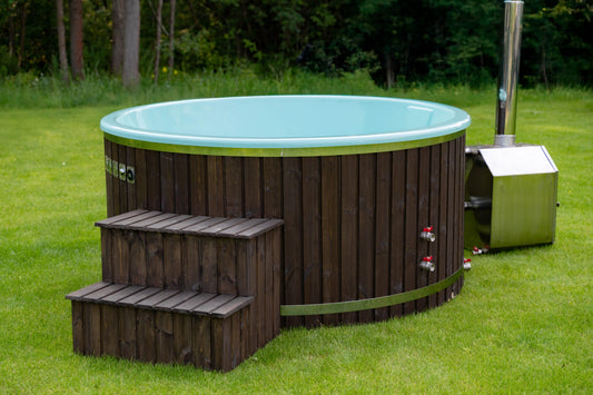 200 cm turquoise fiberglass round hot tub with external wood-fired heater and wooden steps