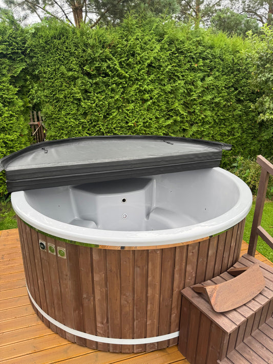 225 cm XL round fiberglass hot tub with half-open insulated cover, top view of the interior and control buttons